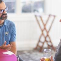 Daniel Bergman talking with peers